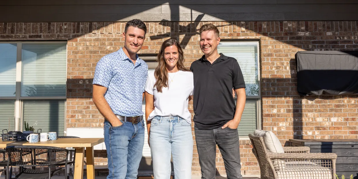 people in front of a house